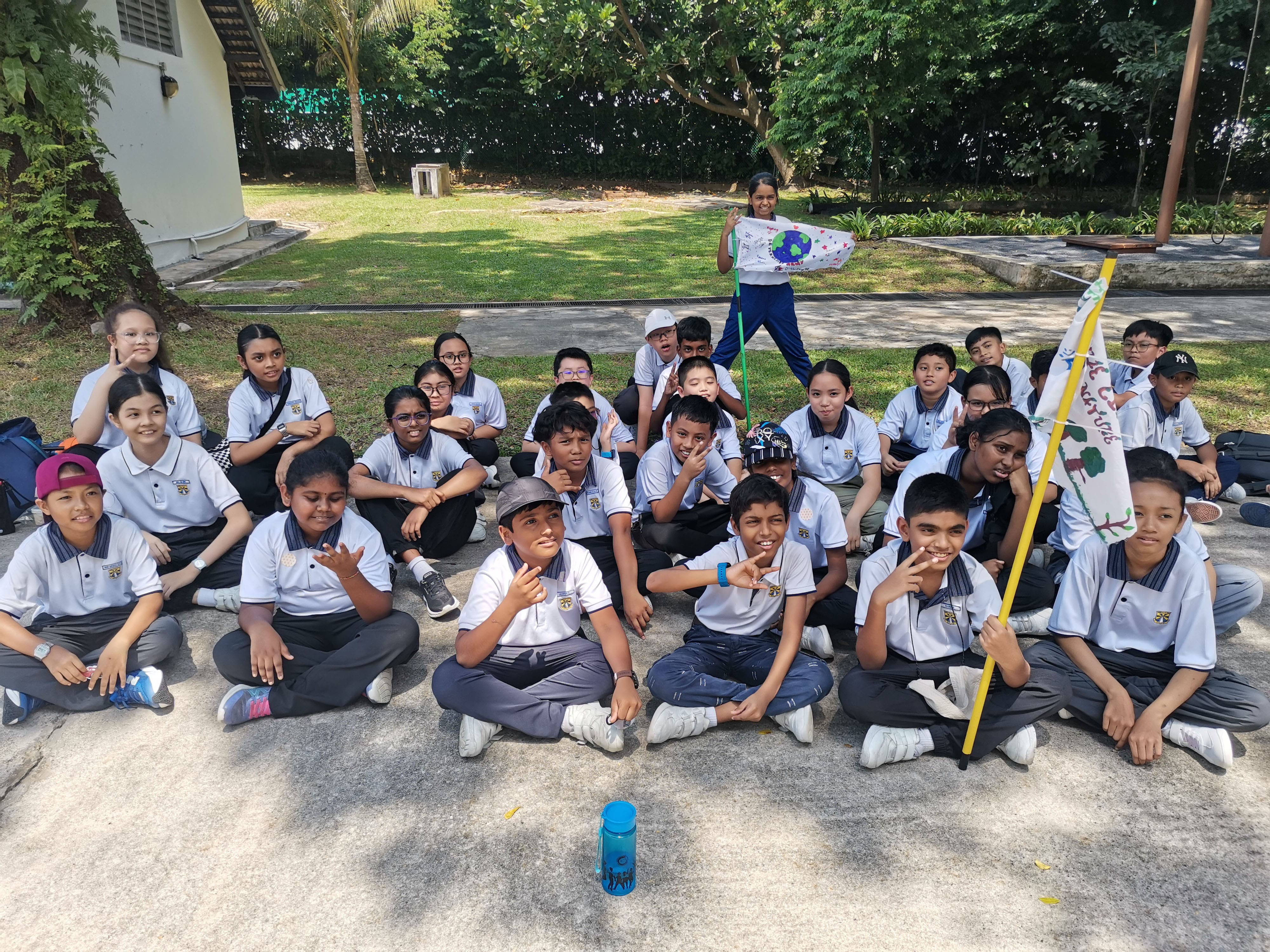 Handmade flags and a group photo - camp creativity on full display